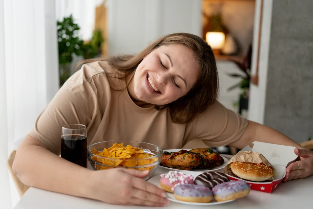 person with eating disorder trying eat fast food